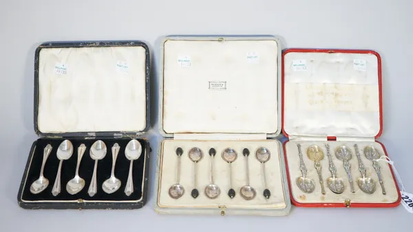 Silver, comprising; a set of six enamelled coffee spoons, modelled as The Coronation Anointing spoon, Birmingham 1901, a set of six coffee spoons, the