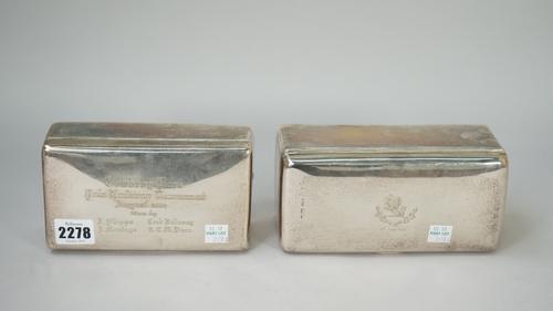 A silver rectangular table cigarette box, the hinged lid, presentation inscribed, wooden lined within, London 1914 and another silver rectangular tabl