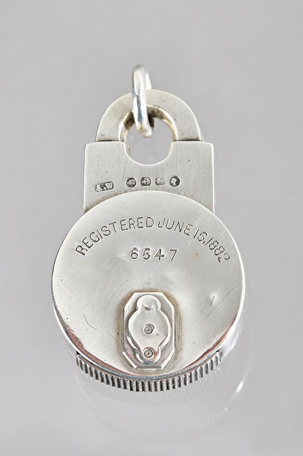 A Victorian silver vesta box, modelled as a padlock, detailed Registered June 16.1882 6547, Birmingham 1882, maker probably Alfred Wigley, gross weigh