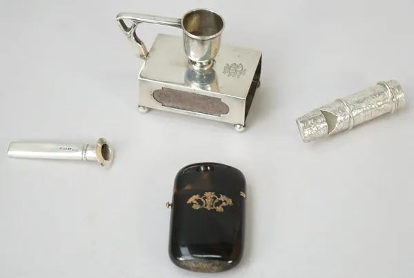 Silver, comprising; a Victorian vesta case cum whistle, with scroll engraved decoration, probably Birmingham 1885, a matchbox/candle holder, import ma