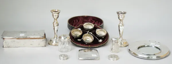 Silver and silver mounted wares, comprising; a set of four Victorian salts, each of circular form, with partly fluted decoration, raised on three sphe