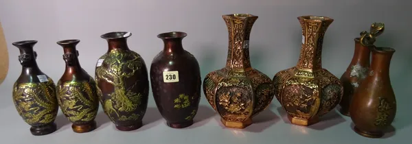 Asian interest, a group of 20th century bronze vases, including some pairs, (qty).