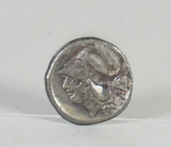 A Corinth Anactorium silver stater, the obverse with the portrait of Athene, the reverse depicting Pegasus, weight 8.2 gms.