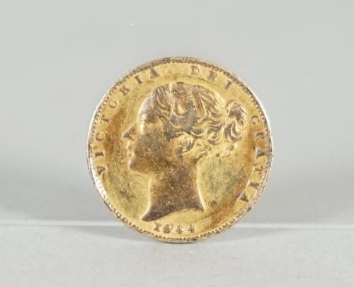 A Victoria young head shield back sovereign 1844.