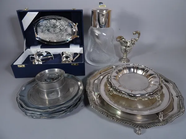 Silver plated wares, including; a large Asprey water jug, 30cm tall, plated salvers, pewter dishes and sundry.