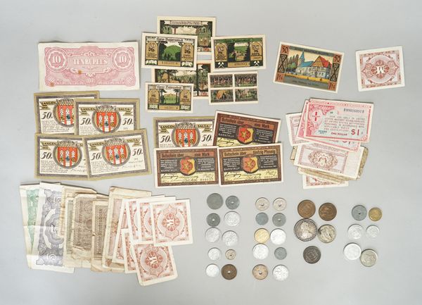 A collection of foreign coins, including a Charles III eight reales pillar dollar Mexico City Mint 1772, an Irish half crown 1928, three Jersey pennie