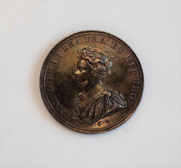 A Queen Anne silver medallion, commemorating The Capture of Mons 1709, the obverse with a portrait of The Queen, the reverse with a view of the city,