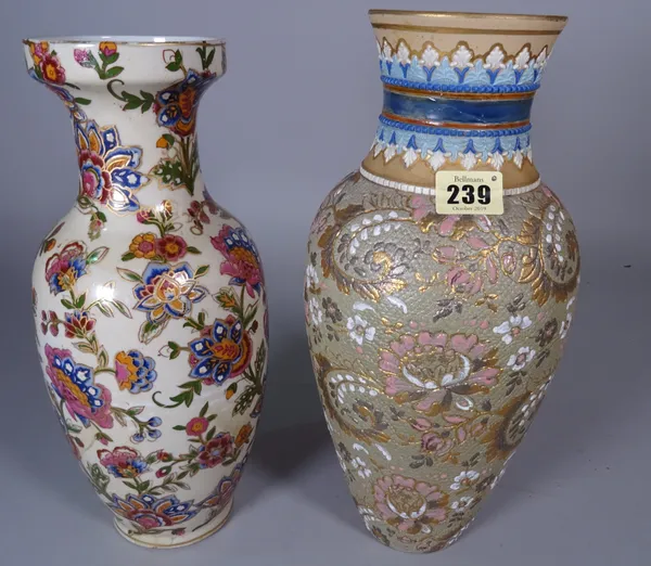 A Royal Doulton stoneware vase decorated with flowers and another floral vase, 36cm high.