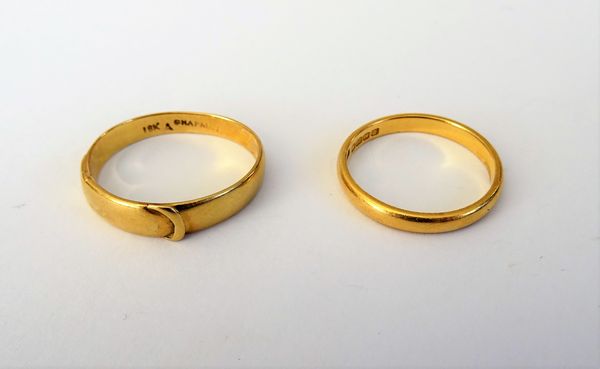 A 22ct gold plain wedding ring, Birmingham 1949, weight 2.4 gms, ring size J and a half and a gold ring detailed 18K, Chapman, weight 2.7 gms, ring si