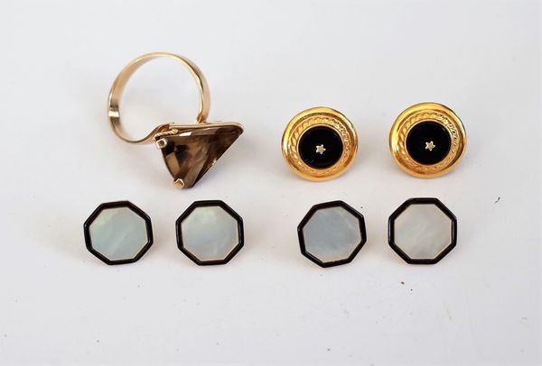 A set of four gold, mother-of-pearl and black enamelled octagonal dress buttons, each mother-of-pearl front with a black enamelled border, detailed to