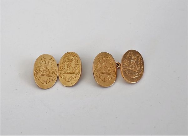 A pair of 9ct gold cufflinks, the oval backs and fronts engraved with crests and mottos, Birmingham 1934, weight 11.3 gms.