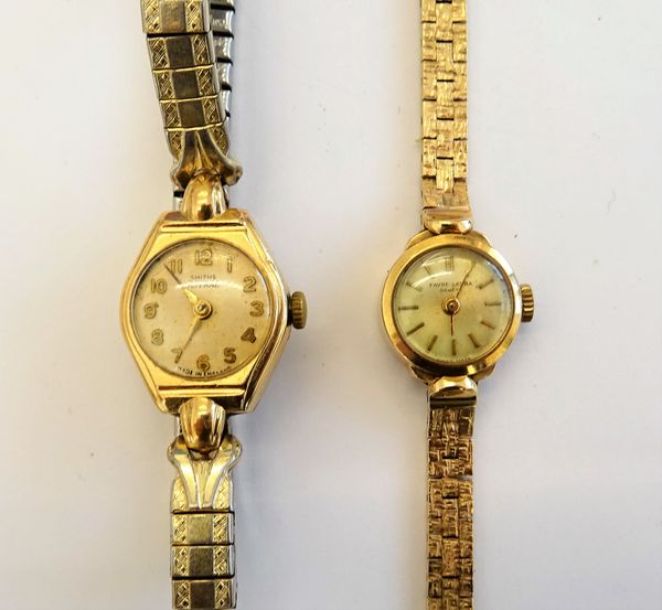 A Favre-Leuba 9ct gold cased lady's bracelet watch the  dial signed, with baton indicators, to a manual wind movement, on a textured gold bracelet, wi