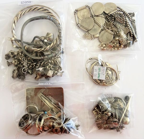 Mostly silver jewellery, comprising; a charm bracelet, another bracelet, three bangles, five necklaces, ten rings, two pendants, nine pairs of earring