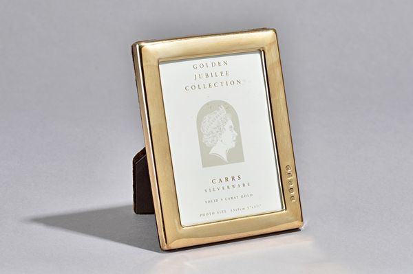 A 9ct gold mounted, rectangular plain photograph frame, detailed within Golden Jubilee Collection, Photo Size 13 x 9cm, size of frame 16cm x 12.2cm, S