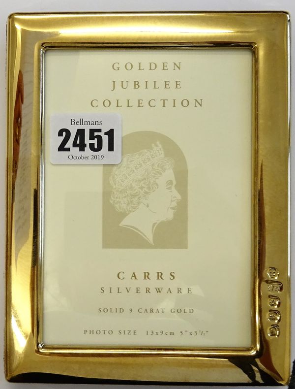 A 9ct gold mounted, rectangular plain photograph frame, detailed within Golden Jubilee Collection, Photo Size 13 x 9cm, size of frame 16cm x 12.2cm, S