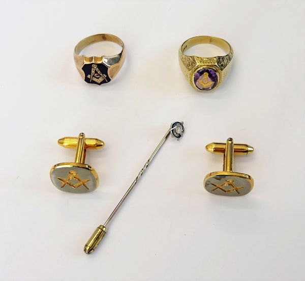 A small collection of Masonic jewellery, comprising; a gold signet ring, enamelled in blue, detailed 10K, another yellow metal and amethyst signet rin