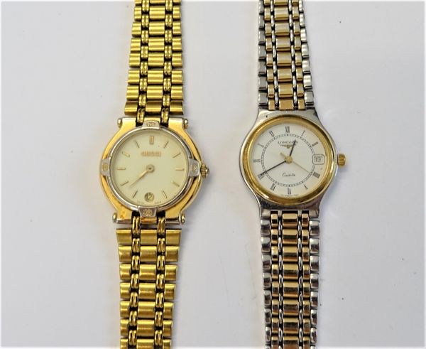 A Longines Quartz steel and gilt lady's bracelet wristwatch, the signed white dial with black Roman numerals and with a date of the month aperture, wi