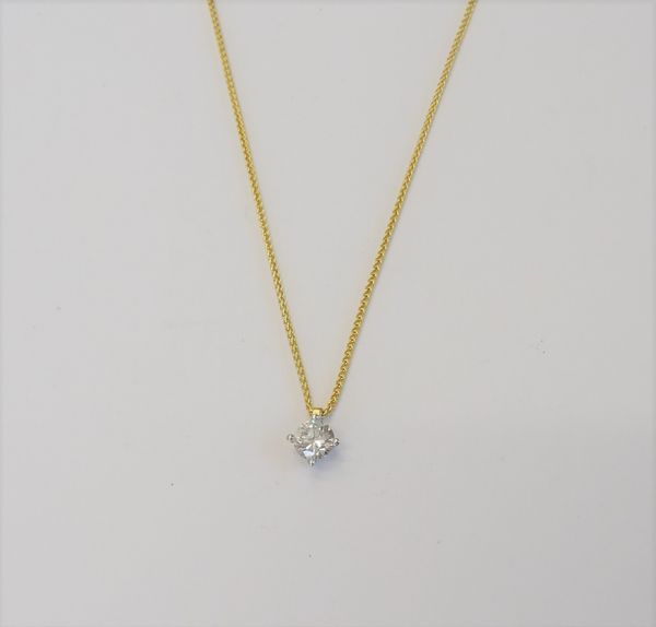 A diamond set single stone pendant, mounted with a circular cut diamond, with a 9ct gold multiple link neckchain, on a boltring clasp, (2).