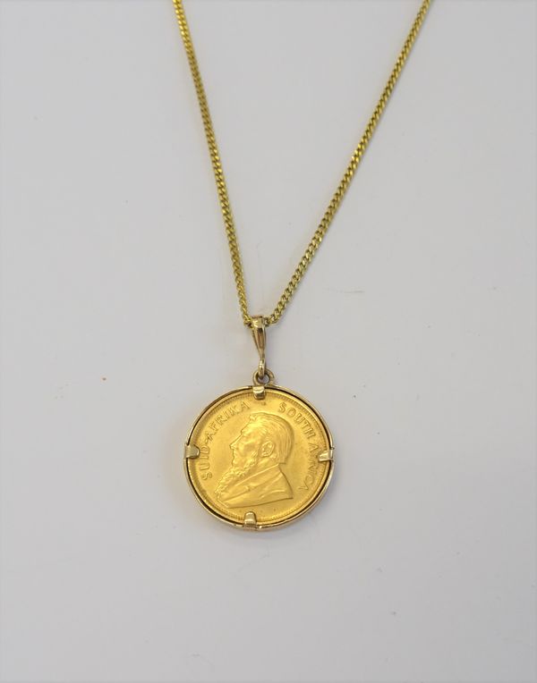 A South Africa one quarter krugerrand 1980, in a gold pendant mount with a gilt metal neckchain, on a bolt ring clasp.