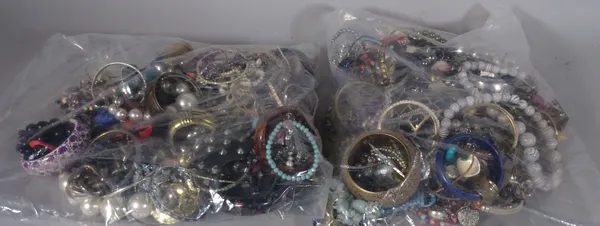 Costume jewellery; a large quantity of 20th century costume jewellery, including bangles, necklaces and rings, (qty).