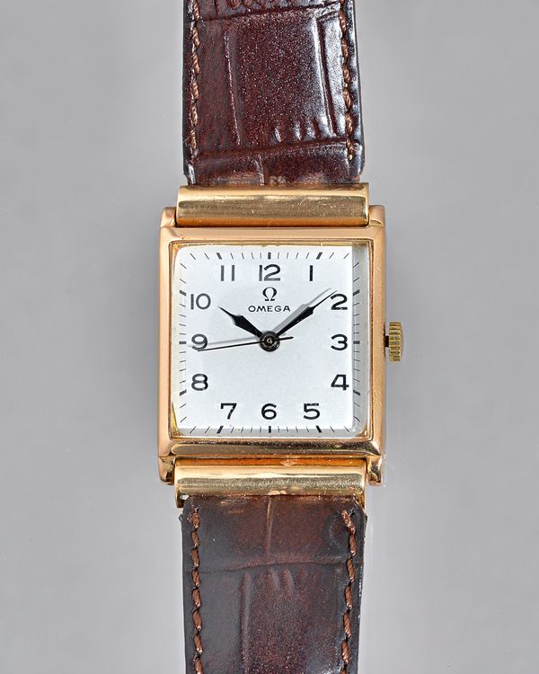 An Omega gold, square cased gentleman's wristwatch, with a signed jewelled movement, numbered 8572846, the signed white dial with black Arabic numeral