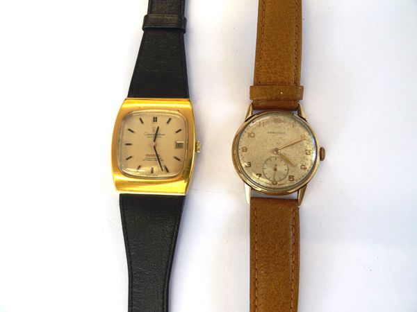 An Omega Constellation Automatic gilt metal fronted and steel backed gentleman's wristwatch, the signed curved square gilt dial with black baton numer