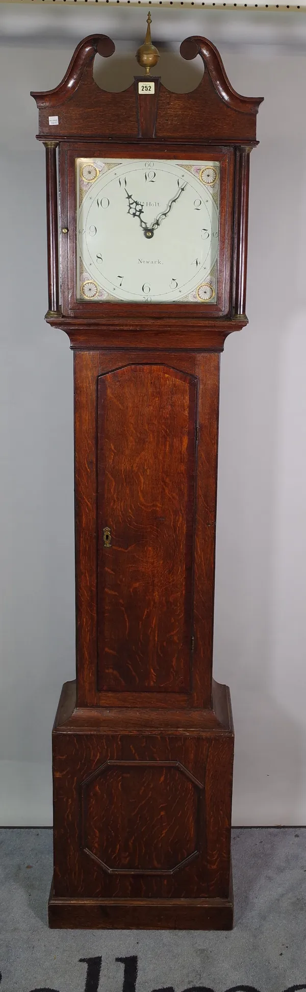 R.D. Holt, Neward, a late 19th century oak longcase clock, with painted dial, 43cm wide x 198cm high, (one weight and pendulum).