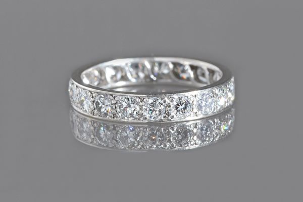 A diamond set full eternity ring, mounted with circular cut diamonds, ring size M, gross weight 3.3 gms, with a case.