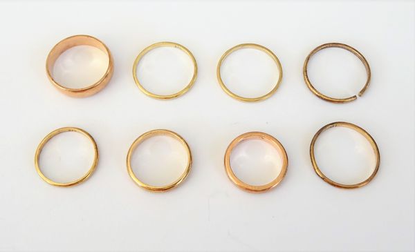 A 9ct gold plain wedding ring, London 1930, a 9ct gold plain wedding ring, Birmingham 2000 and six further wedding rings, mostly detailed 375, probabl