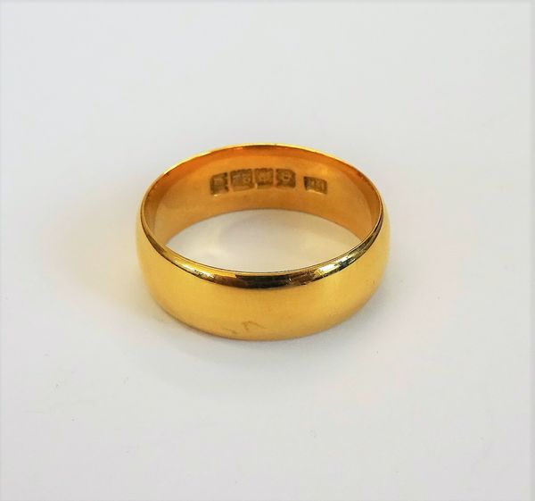 A 22ct gold plain wedding ring, London 1917, ring size Q, weight 7.8 gms.