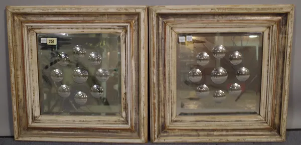 A pair of early 20th century square framed wall mirrors, cream/gilt distressed with convex pattern to the bevelled glass, dated 1912 to the rear, 48cm