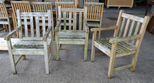 Westminster Teak; a set of five garden open armchairs and a pair of matching low square side tables, 49cm wide x 40cm high, (7).