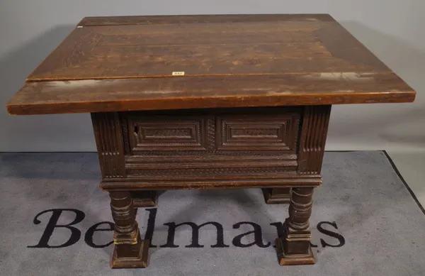 A 19th century and later oak dining table on carved pedestal base, 100cm wide x 74cm high.