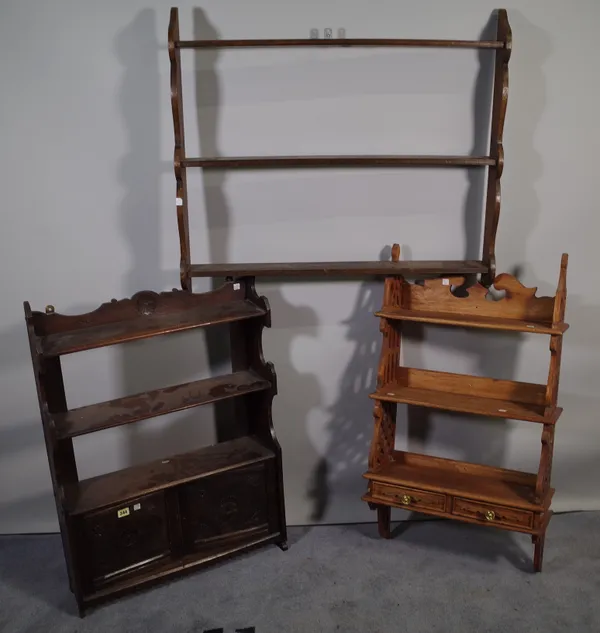 18th century style furniture, comprising; an oak hanging shelf with cupboard base, 62cm wide x 86cm high, an oak three tier hanging shelf, 86cm wide x