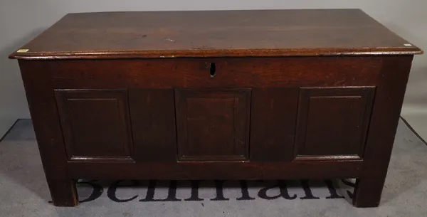 An 17th century and later oak triple plank coffer, 125cm wide x 65cm high.