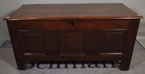 An 17th century and later oak triple plank coffer, 125cm wide x 65cm high.