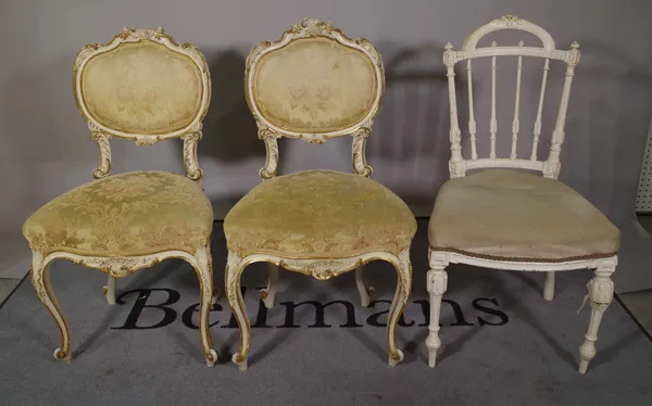 A set of four Louis XV style white painted and parcel gilt dining chairs and a Louis XVI style white painted dining chair, (5).