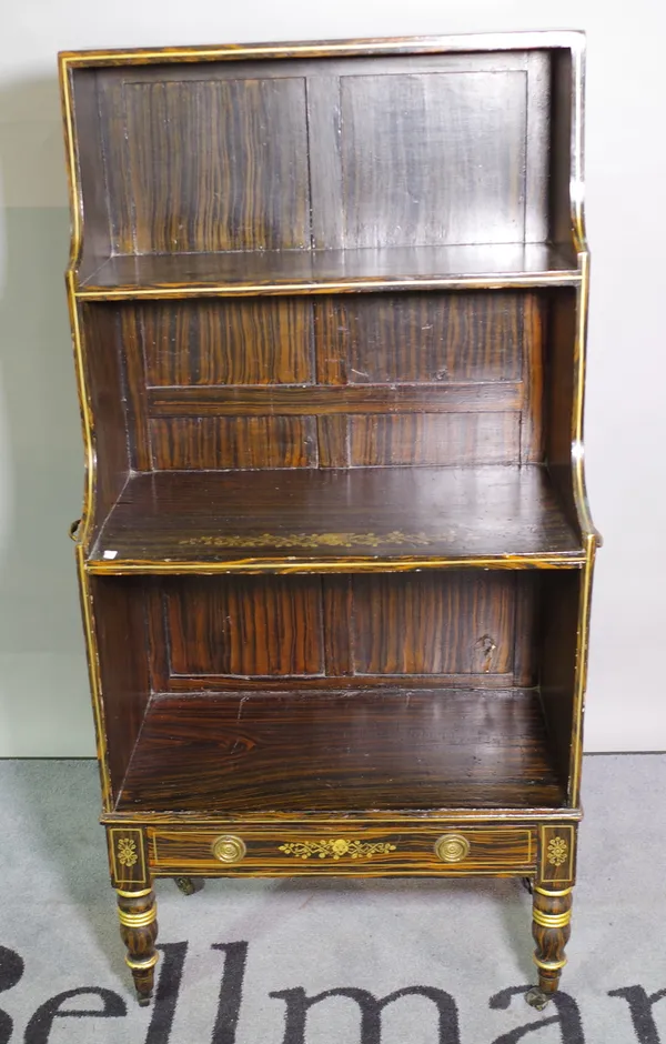 A 19th century faux painted rosewood waterfall bookcase, with single drawer on tapering supports, 57cm wide x 118cm high.