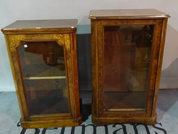 A late Victorian walnut side cupboard with glazed door on plinth base, 53cm wide x 87cm high, another similar 55cm wide x 95cm high, (2).