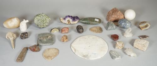 A large alabaster dish, late 19th century, of circular form with a single plain handle, 53.5cm diameter, a green flint hand axe, 11cm and various geol