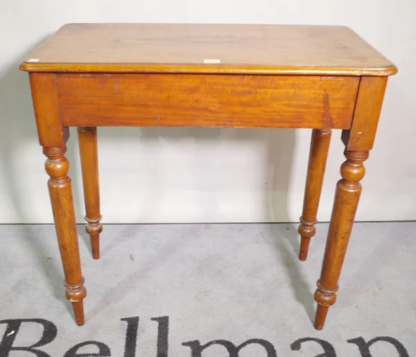 A Victorian mahogany side table on ring turned tapering supports, 76cm wide x 74cm high.