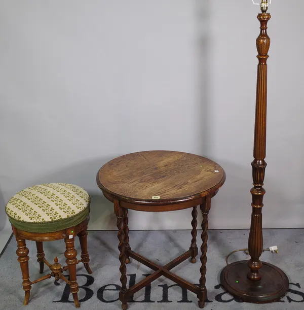 An 18th century style oak circular occasional table, 67cm diameter x 63cm high, a late Victorian stained beech piano stool, 42cm wide x 54cm high and