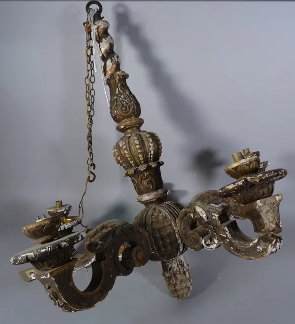 An Italian carved wooden five branch chandelier, 19th century, distressed grey with gilt traces, acanthus carving to stem and arms, 70cm high, (a.f.).