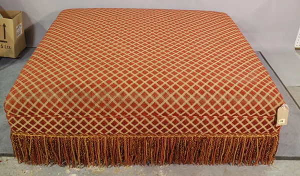 A 20th century large rectangular footstool, with red and gold upholstery, 115cm wide x 40cm high.