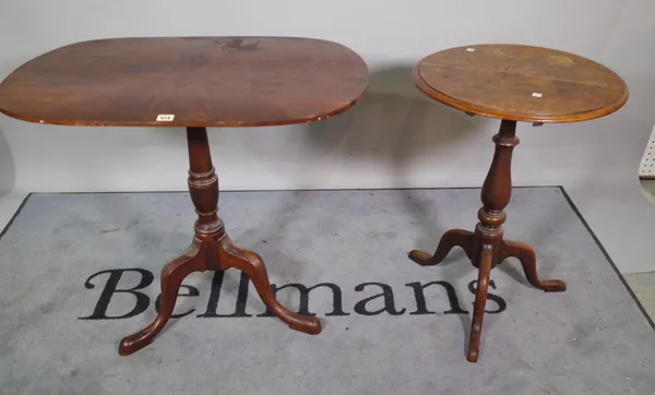 A George III and later mahogany tripod table, with later added oval walnut top, 83cm wide x 70cm high and a George III mahogany tripod table, on outsw