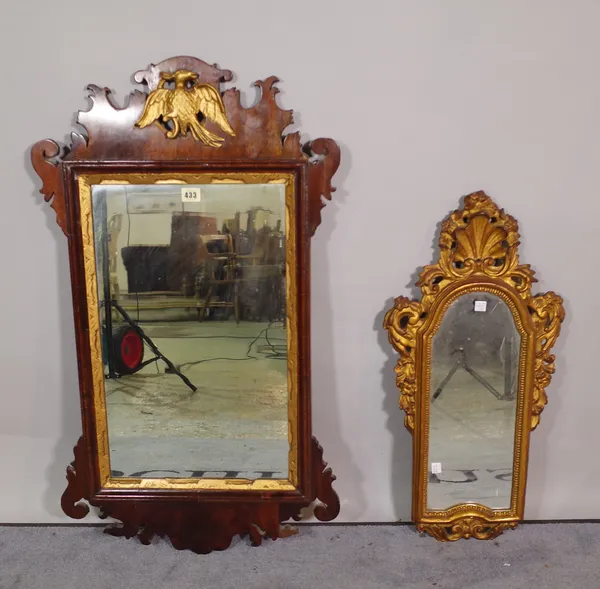 A George III fret cut pier mirror with Ho-ho bird crest, 57cm wide x 89cm high and another small gilt framed mirror with a shell crest, 33cm wide x 65