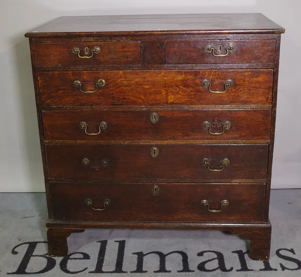 A George III oak chest of two short and four long graduated drawers, on bracket feet, 96cm wide x 109cm high.