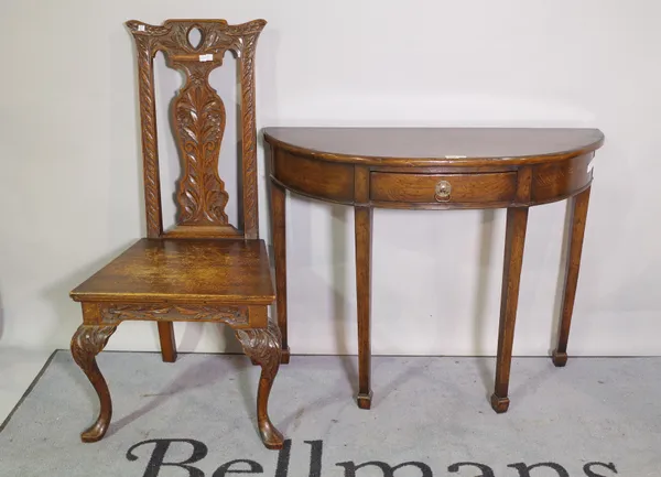 An oak demi-lune single drawer side table, 98cm wide x 76cm high together with a 17th century style carved oak side chair (r.t.c), 55cm wide x 108cm h