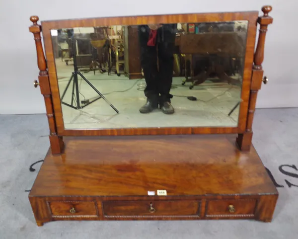 A William IV mahogany toilet mirror with a three drawer base, 88cm wide x 73cm high.