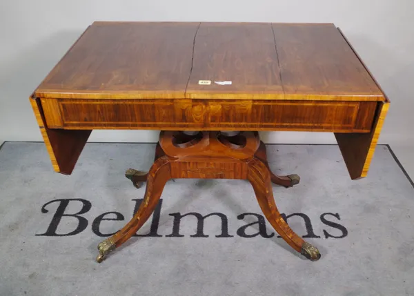 A late George III figured yew banded kingwood sofa table with pair of frieze drawers on four downswept supports, 95cm wide x 73cm high.